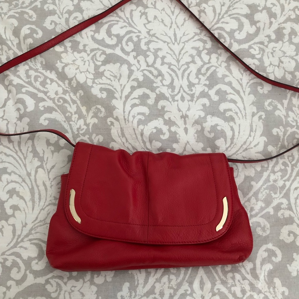 B. Makowsky red leather cross body/clutch